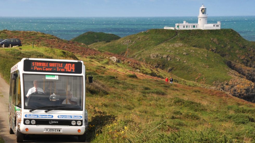 Minibus driving near the Strumble Head lighthouse