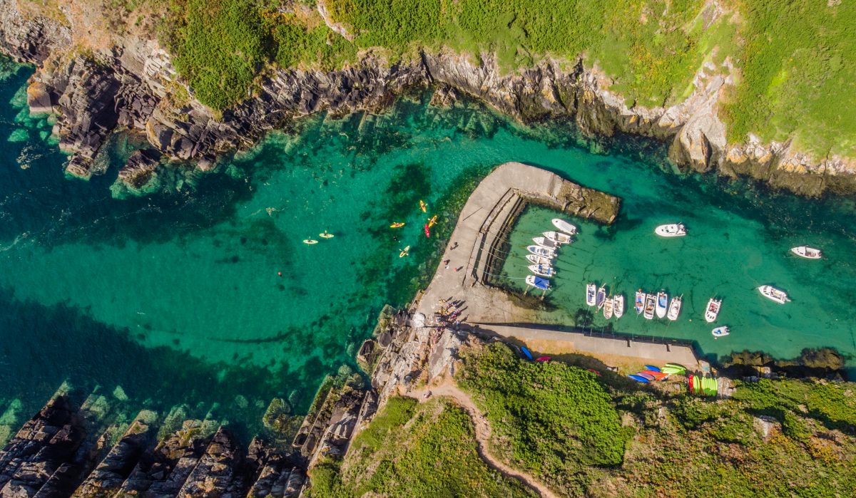 Kayakers at Porth Clais harbour near St Davids in the Pembrokeshire Coast National Park