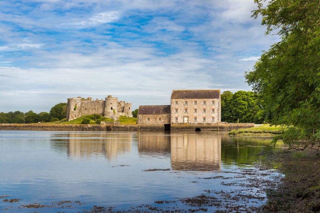 Carew Castle and Tidal Mill, overlooking a Millpond