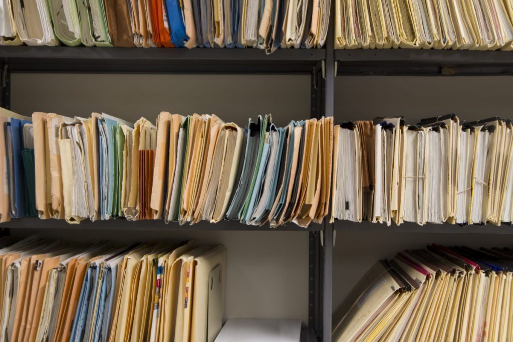 Shelves full of old paper records