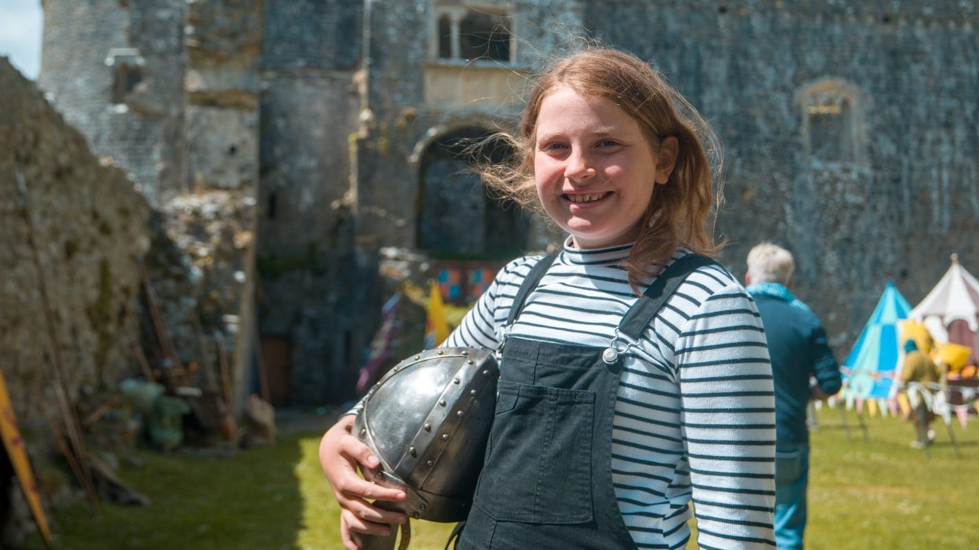 Smiling girl at Carew Castle