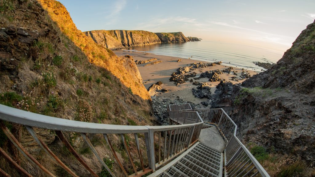 Steps down from the Pembrokeshire Coast Path National Trail to Traeth Llyfn