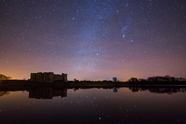 Starry skies above Carew Castle