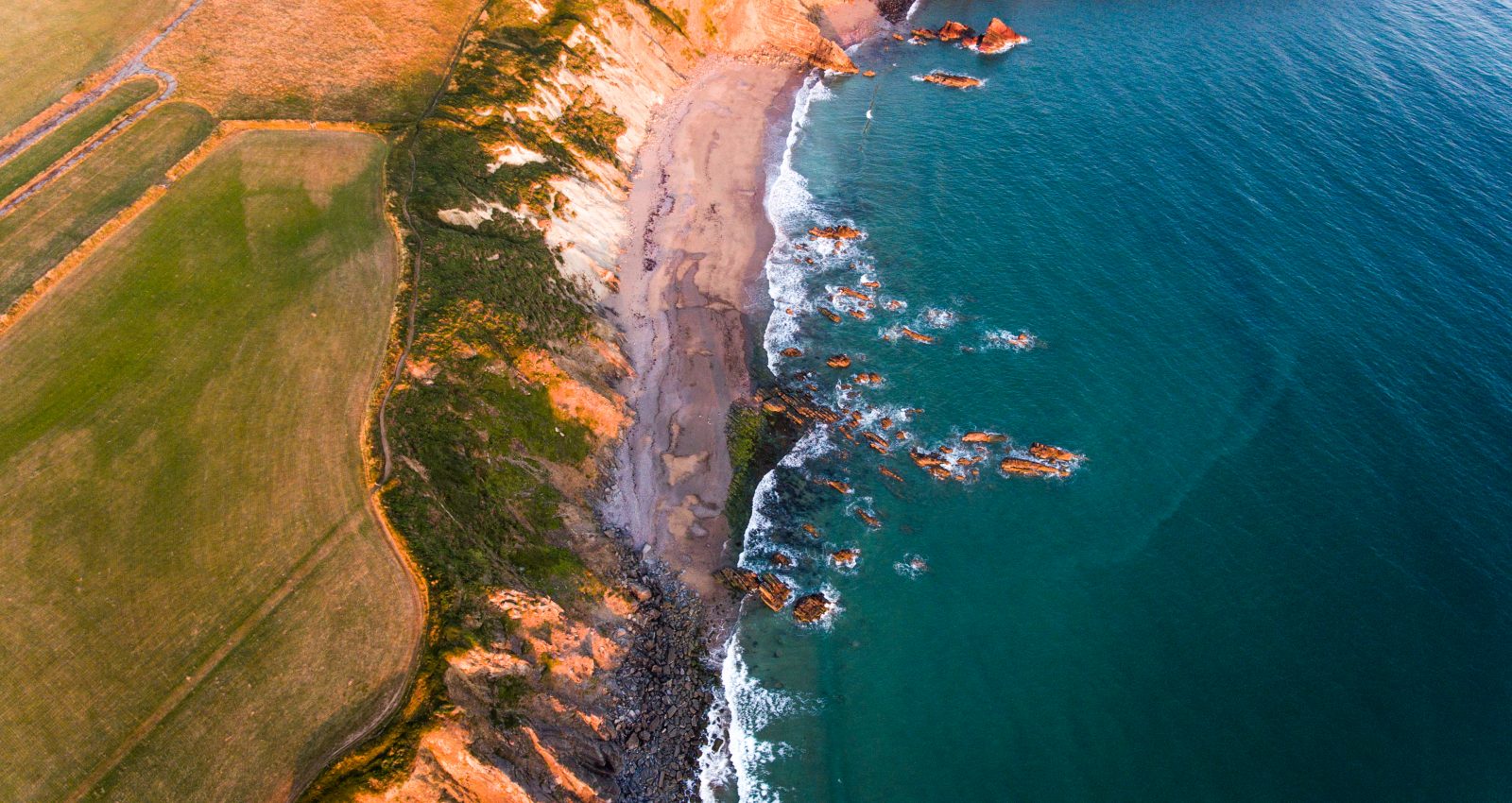 Awrial photograph of cliffs and beach