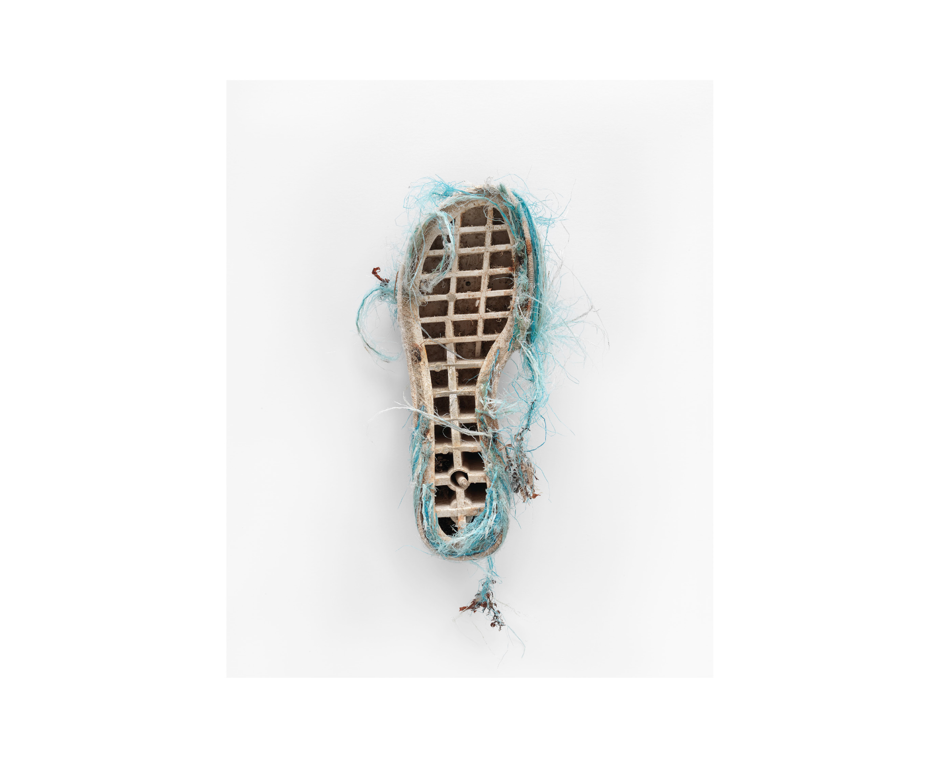 Photograph of a sole of a degraded platform shoe