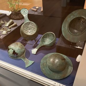 Roman archaeological finds in a museum cabinet