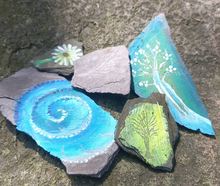 Colourful fossils painted onto rocks