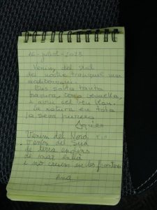 Poem written in Catalan in a notepad. The poem is signed 'Ama'