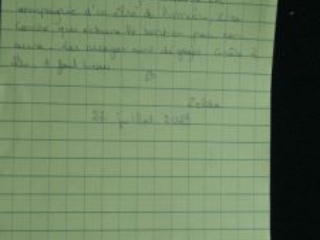 French poem written in a notebook. It is signed Zelda and date 27 July 2023.