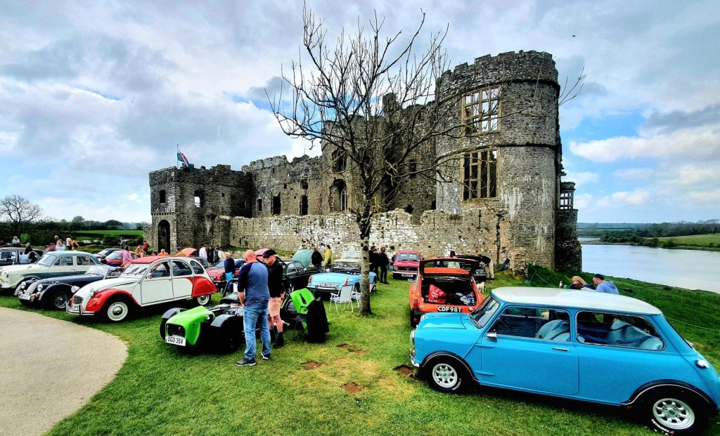 Classic cars parked outside Carew Castle