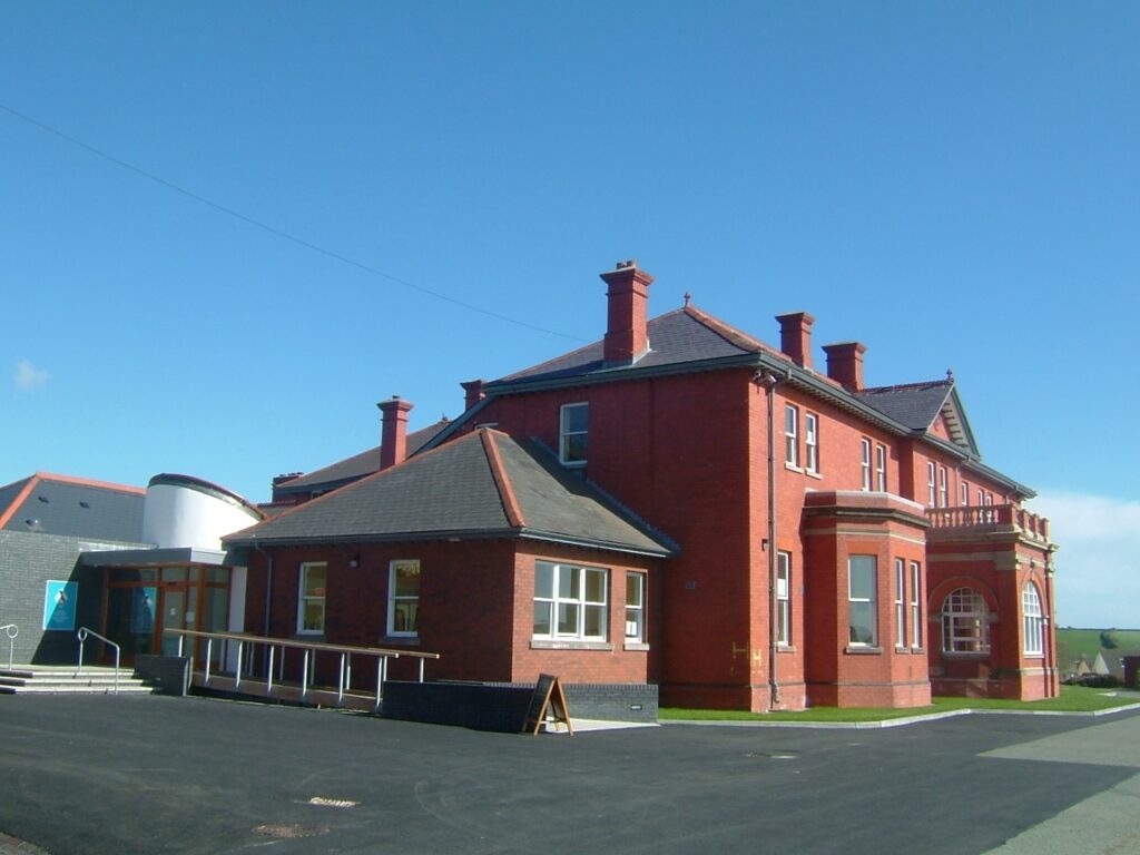 The exterior of PCNPA's Llanion Park HQ on a fine day