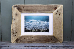 An image of a piece of art by Jen Miles in a rustic frame