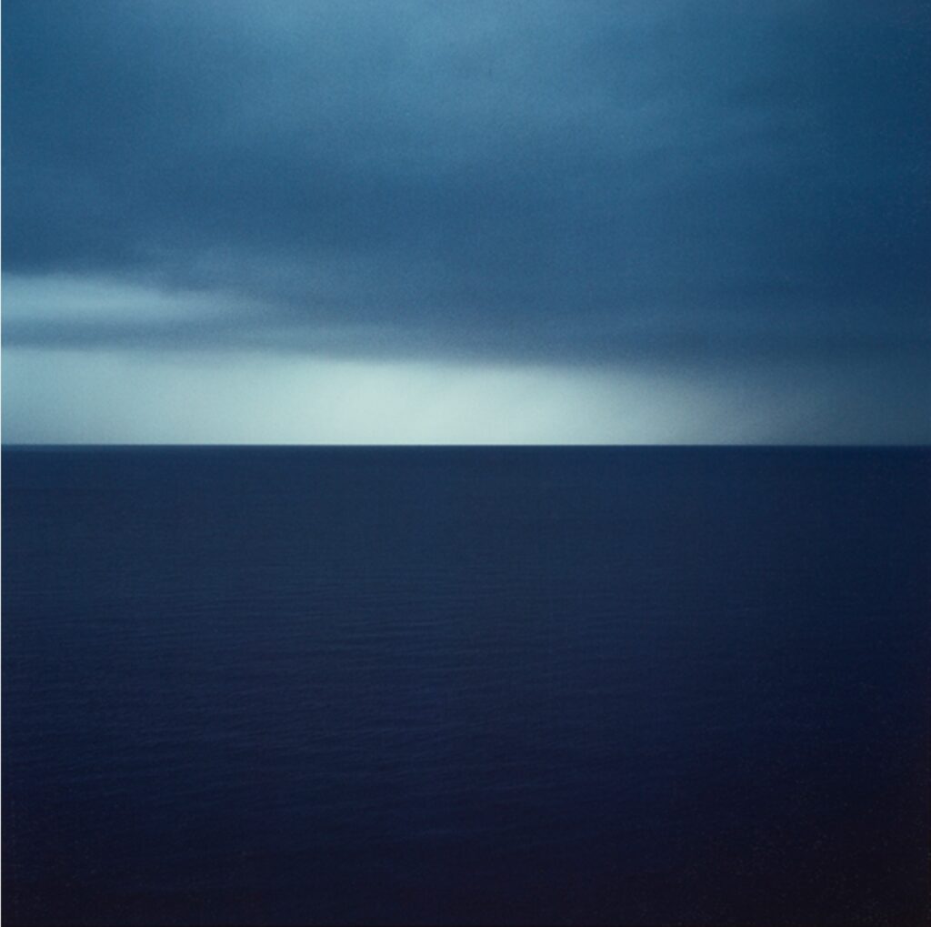 An image of a dark sea horizon