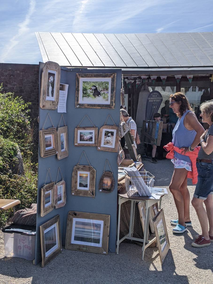 An outdoor craft market in the Oriel y Parc courtyard on a fine summer's day
