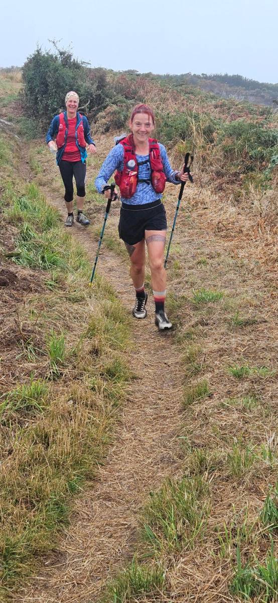 Sanna Duthie running the Pembrokeshire Coast Path on a fine day