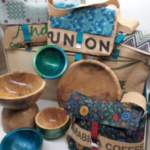 Image of wooden bowls, bags and scarfs